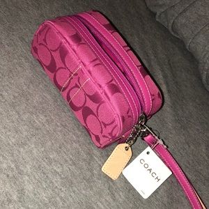 Pink coach wristlet